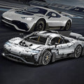 Realistic sports car model and its LEGO Technic counterpart on a racetrack background