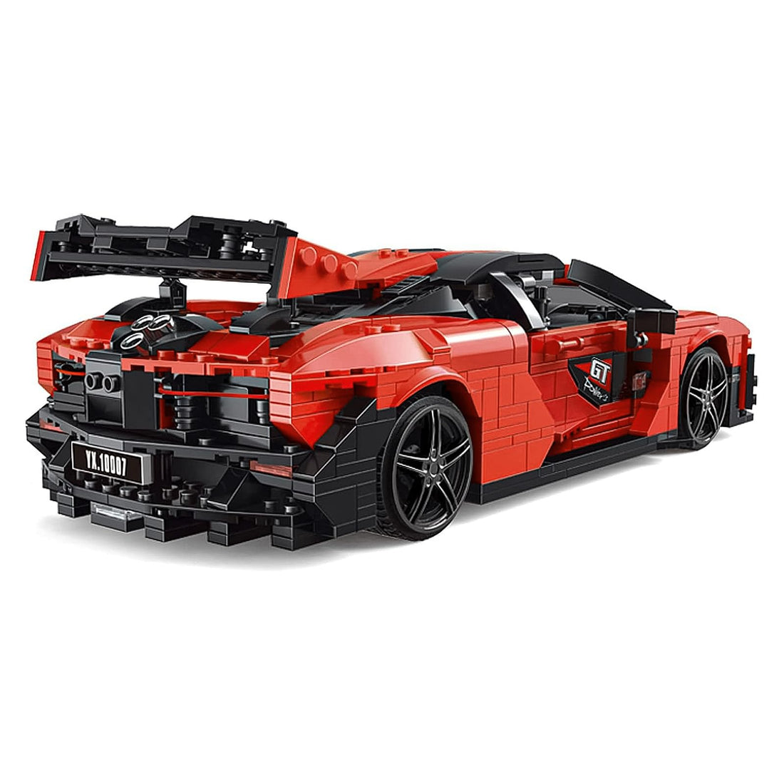 Red sports car model made of interlocking bricks on a white background