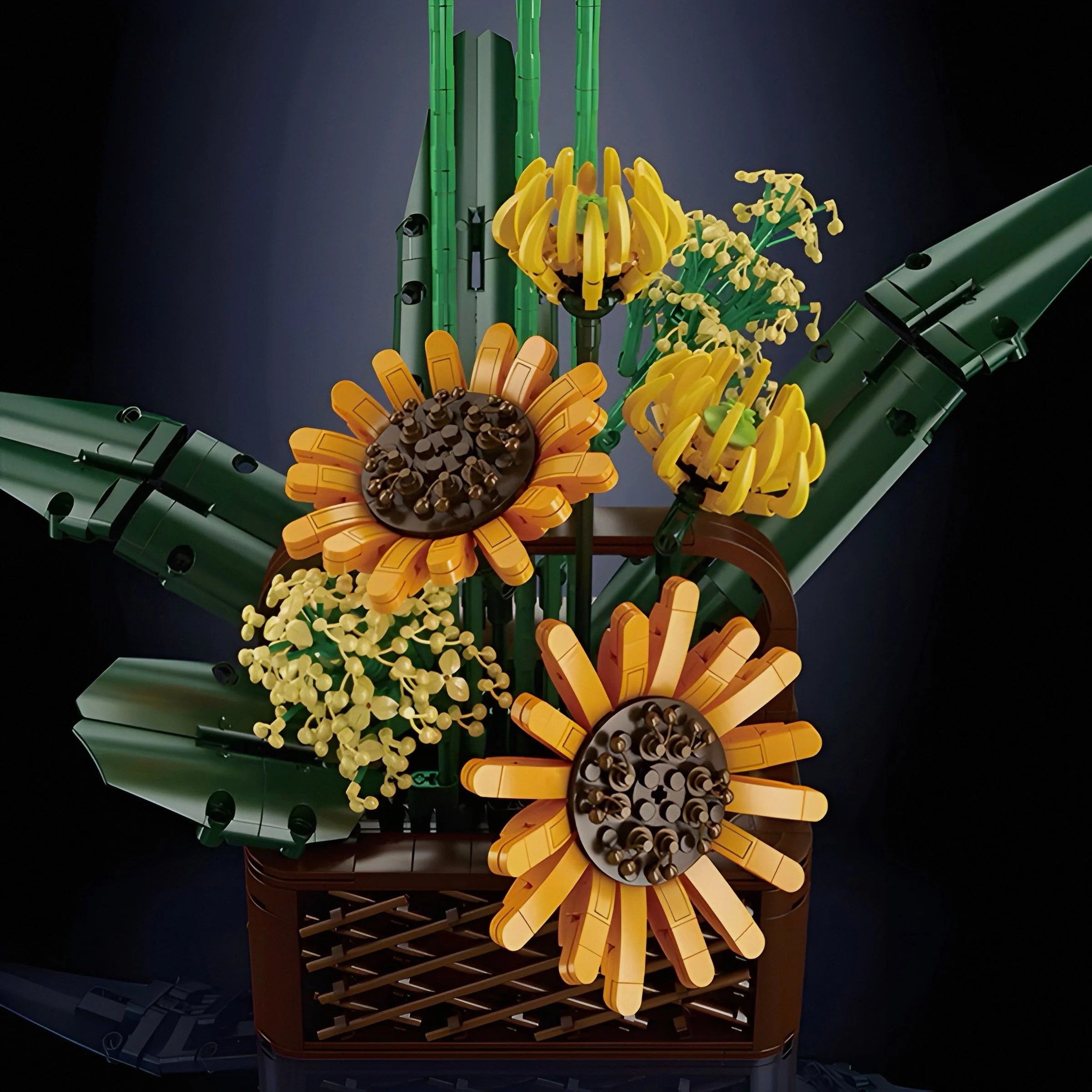 Toy model of a plant with sunflowers and green leaves on a dark background
