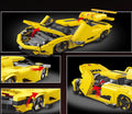 Yellow toy car model with multiple views on a dark background