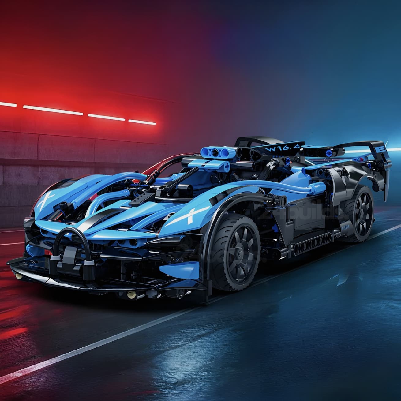 Blue and black sports car model on a reflective surface with red and blue lights in the background