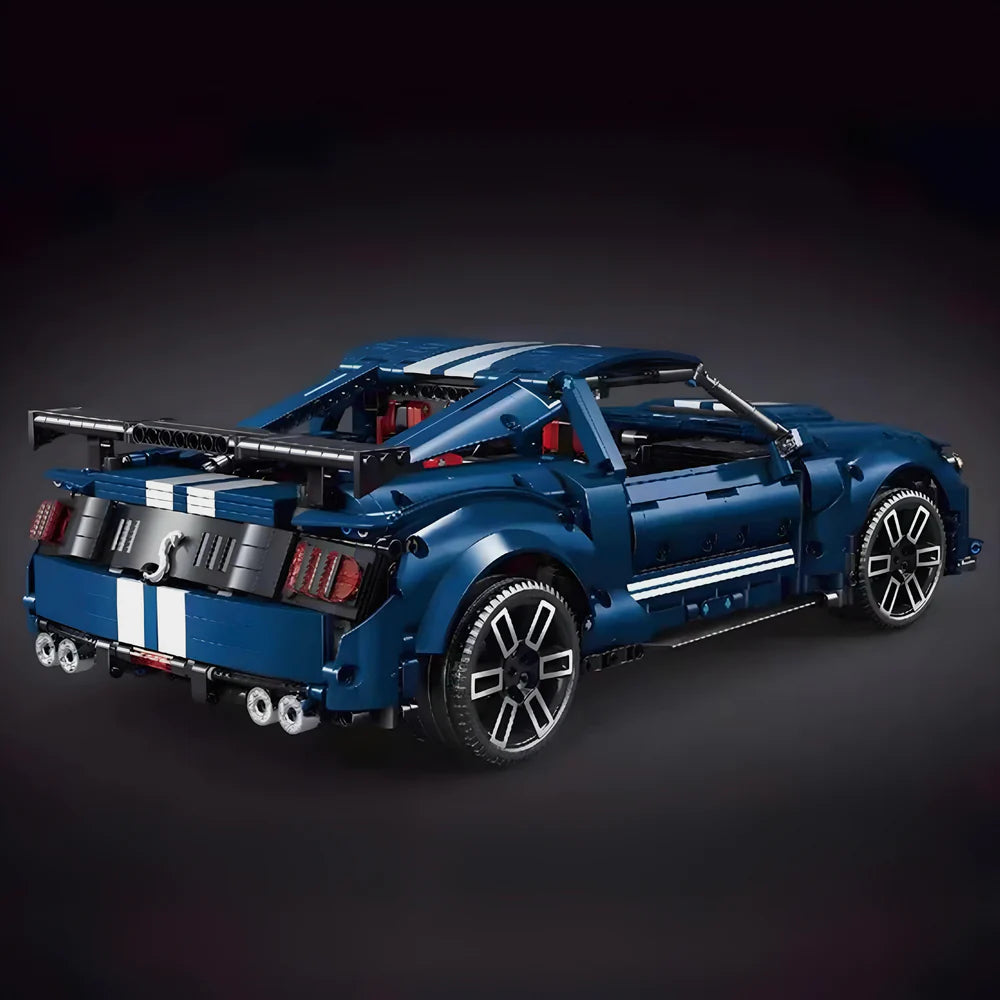 Blue sports car model made of interlocking bricks on a white background
