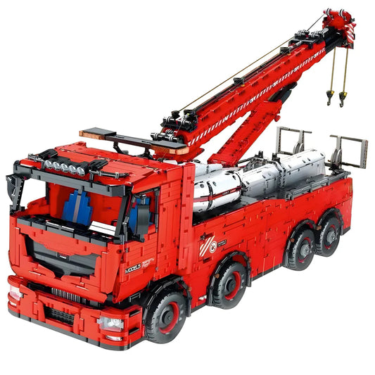 Red toy truck with crane and detailed components on a white background