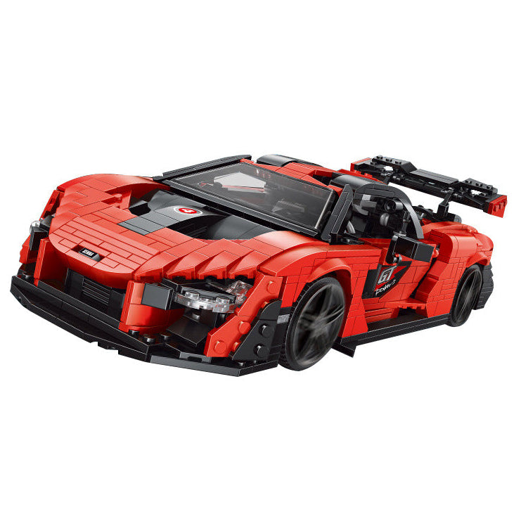 Red sports car model made of interlocking bricks on a white background