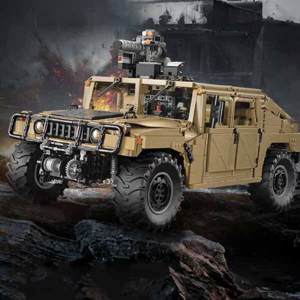 Toy military vehicle on a dark, rocky background